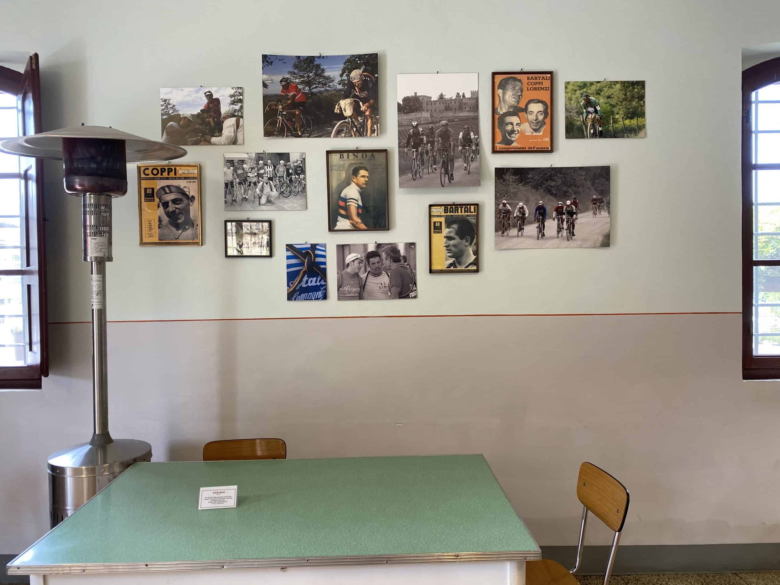 Vintage bicycle art on the wall of Brolio Castle Cafe at Castello di Brolio.